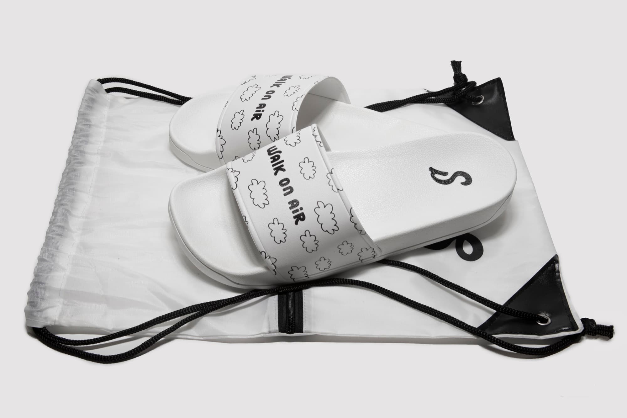Final Slidez slides on the branded drawstring bag